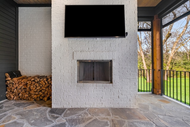 exterior space with a fireplace