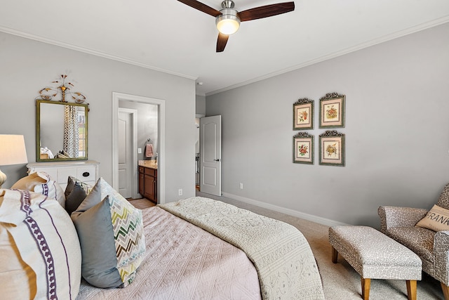 bedroom featuring carpet, ceiling fan, crown molding, and connected bathroom