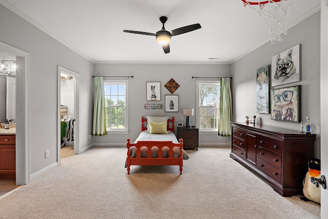 carpeted bedroom with ensuite bath, multiple windows, ornamental molding, and ceiling fan