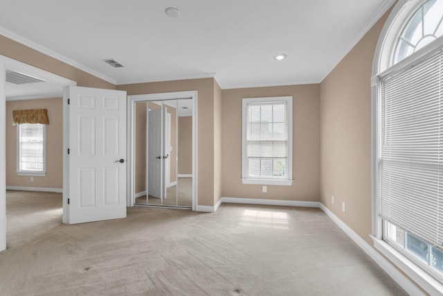 1406 Ottawa Pl, Murfreesboro, TN 37129 - unfurnished bedroom with light carpet, ornamental molding, multiple windows, and baseboards