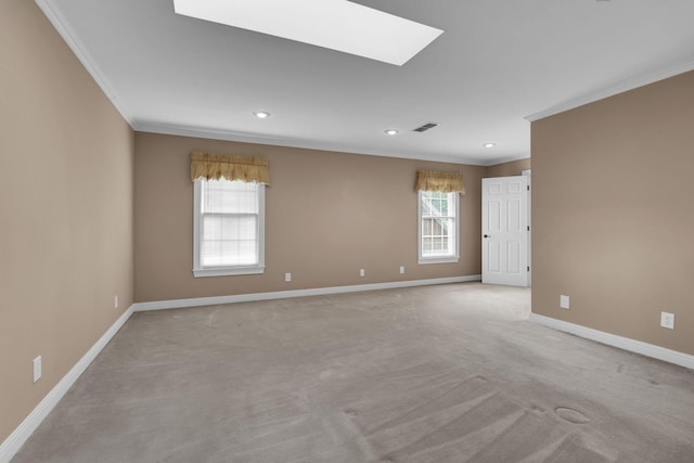 1406 Ottawa Pl, Murfreesboro, TN 37129 - unfurnished room with ornamental molding, a skylight, light colored carpet, baseboards, and recessed lighting