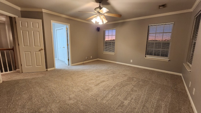 unfurnished bedroom with light carpet, ceiling fan, and ornamental molding