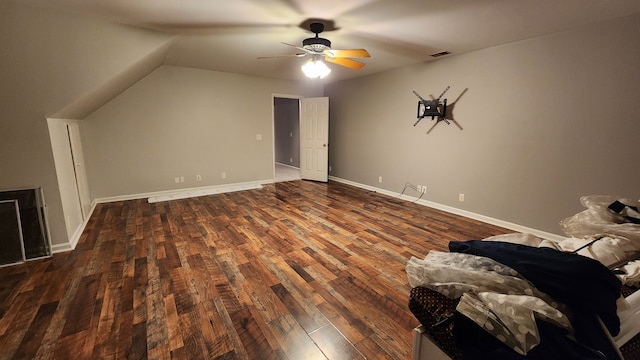 additional living space featuring ceiling fan, dark wood-type flooring, and lofted ceiling