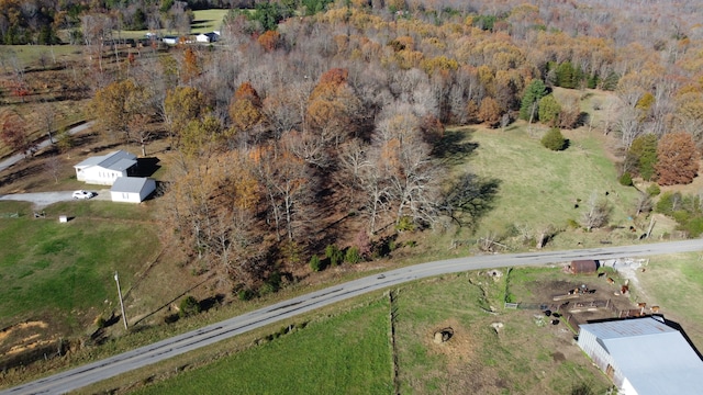 birds eye view of property featuring a rural view