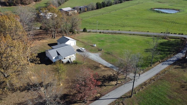 drone / aerial view with a rural view and a water view