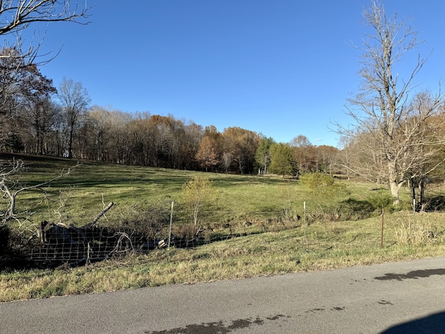 exterior space with a rural view