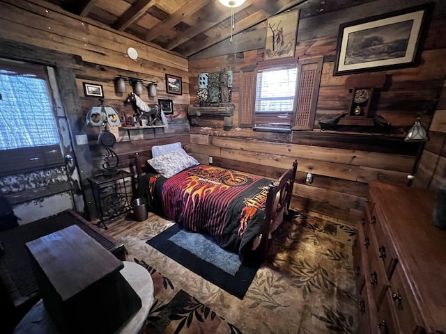 bedroom featuring wooden walls and vaulted ceiling