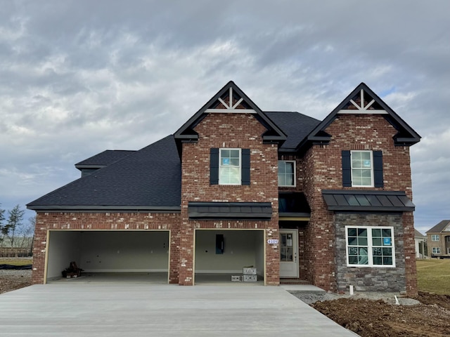 craftsman-style home with a garage