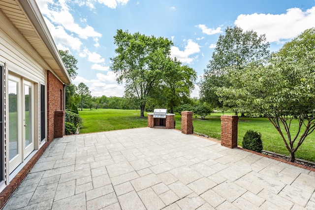 view of patio featuring exterior kitchen