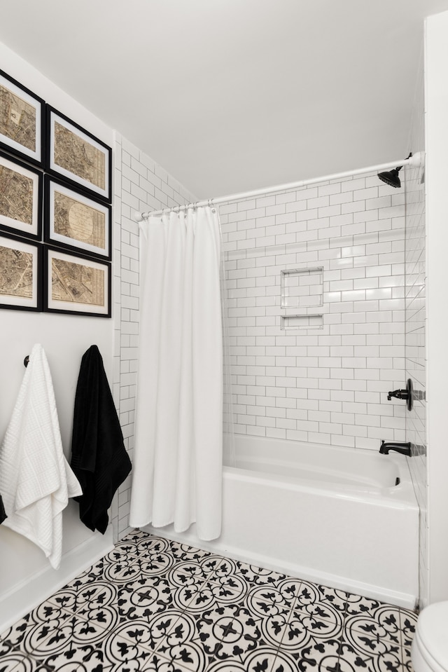 bathroom featuring tile patterned floors and shower / tub combo