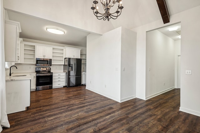 kitchen featuring sink, white cabinets, stainless steel appliances, and dark hardwood / wood-style floors