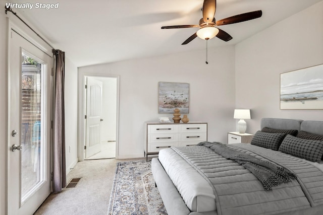 bedroom featuring access to exterior, ceiling fan, light colored carpet, and vaulted ceiling