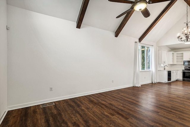 unfurnished living room with dark hardwood / wood-style flooring, ceiling fan with notable chandelier, sink, high vaulted ceiling, and beamed ceiling