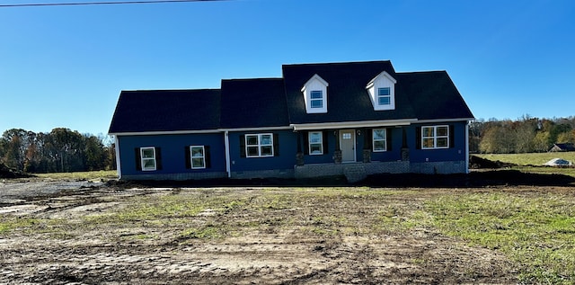 view of new england style home