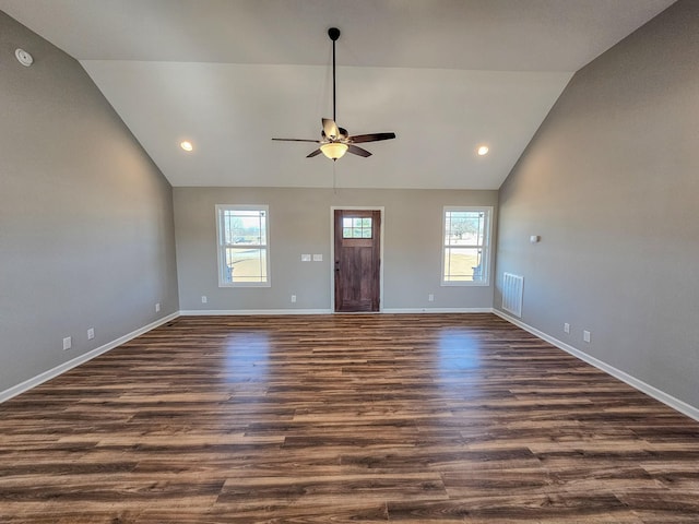 unfurnished living room featuring ceiling fan, high vaulted ceiling, and dark hardwood / wood-style flooring