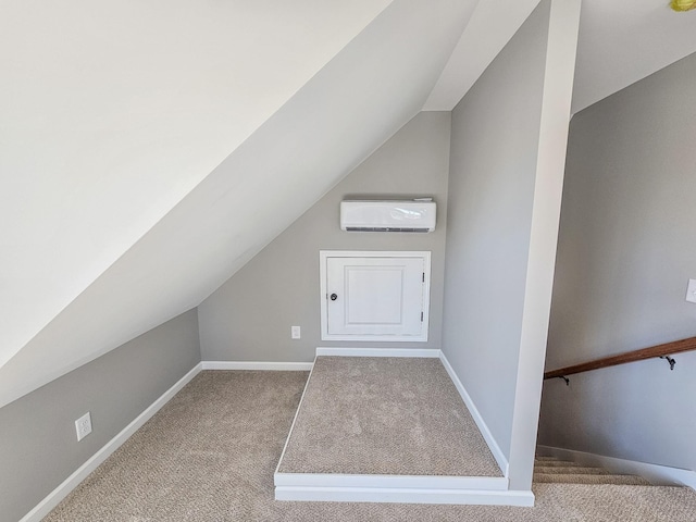 bonus room featuring light colored carpet, lofted ceiling, and a wall mounted AC