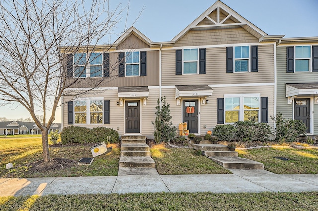 view of property with a front yard