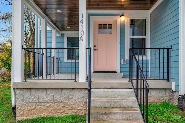 doorway to property with covered porch