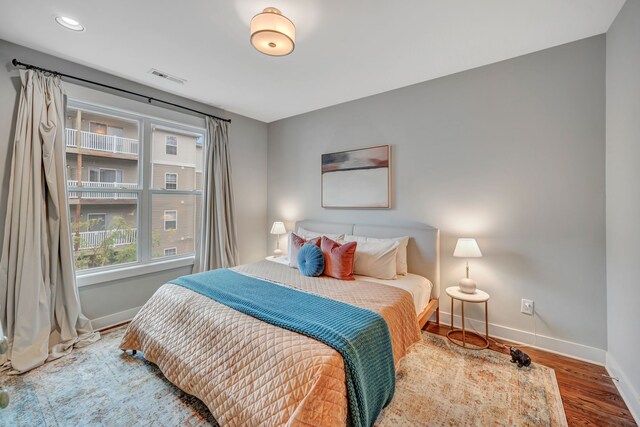 bedroom featuring hardwood / wood-style flooring