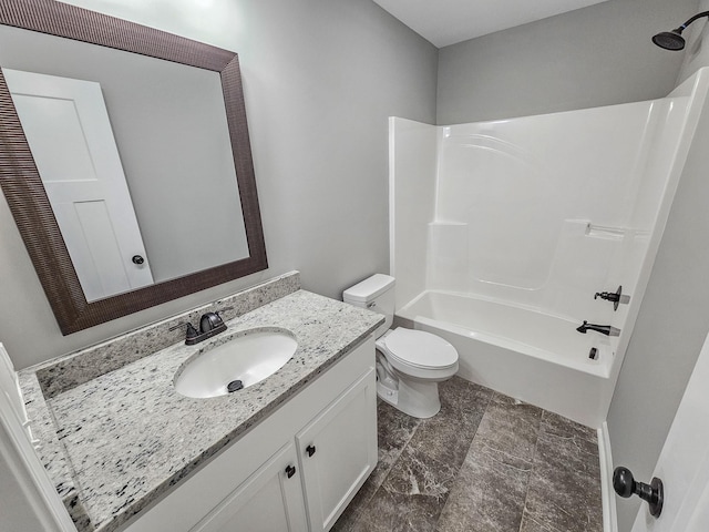 full bathroom with washtub / shower combination, vanity, and toilet