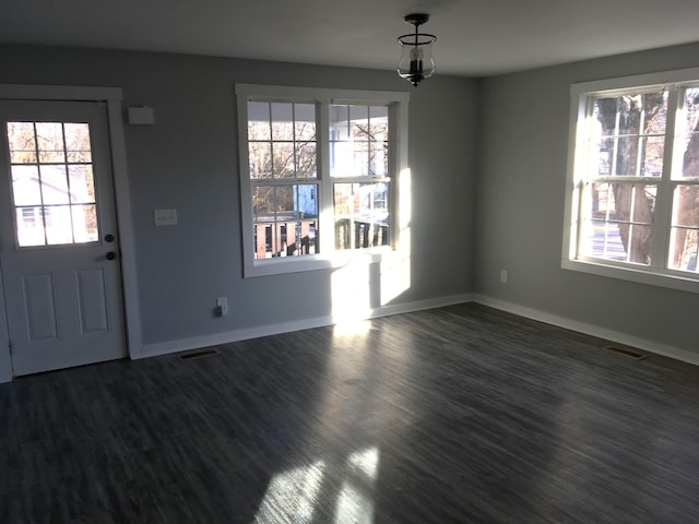 interior space with dark hardwood / wood-style floors