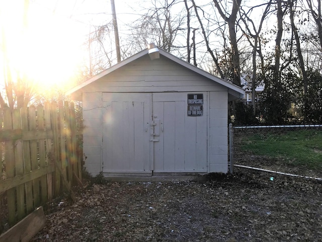 view of outdoor structure at dusk