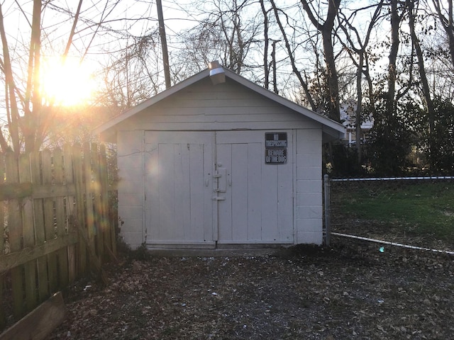 view of outdoor structure at dusk