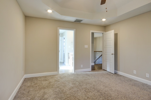 unfurnished bedroom with carpet and ceiling fan