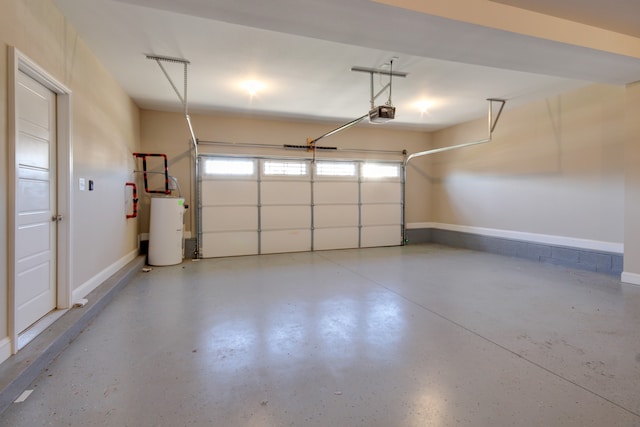 garage with a garage door opener and water heater