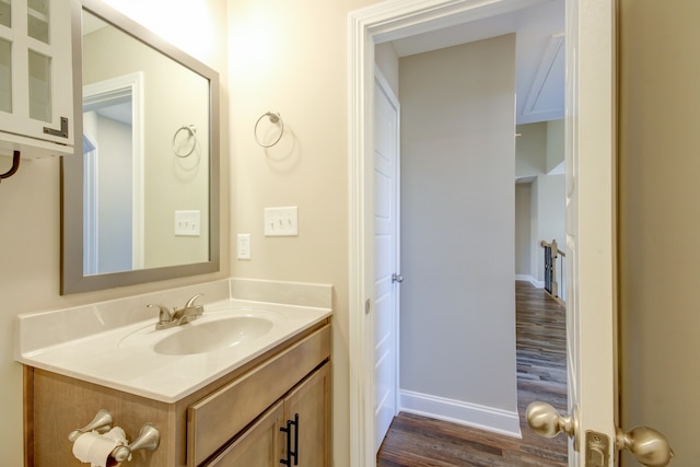 bathroom with wood-type flooring and vanity