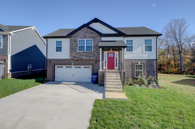 view of front of house featuring a front yard and a garage