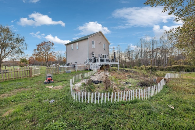 view of yard with a wooden deck