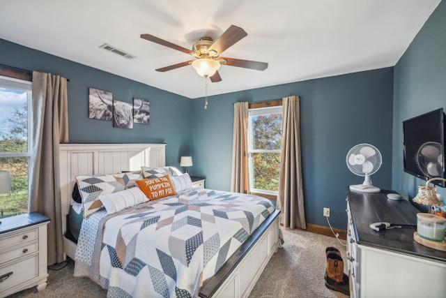 carpeted bedroom with ceiling fan