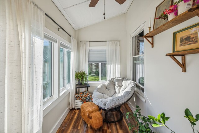 sunroom featuring vaulted ceiling and ceiling fan