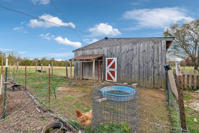 view of outdoor structure featuring a rural view