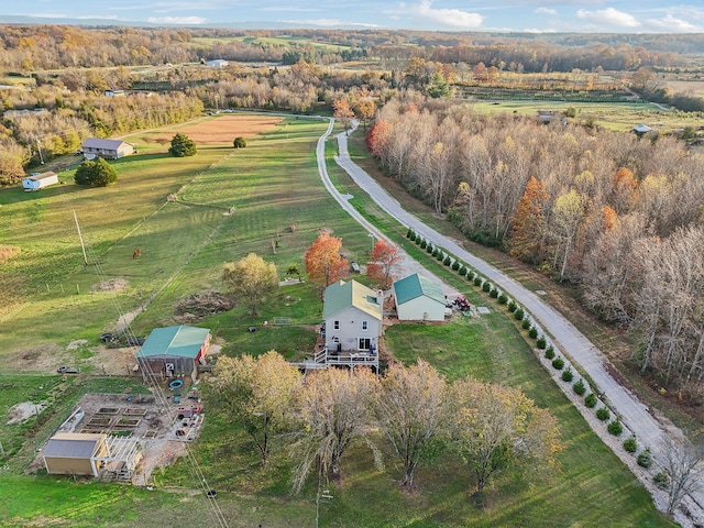 birds eye view of property featuring a rural view