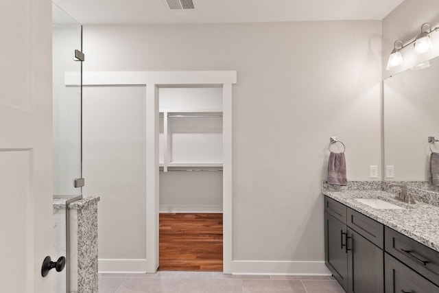 bathroom featuring vanity and tile patterned floors