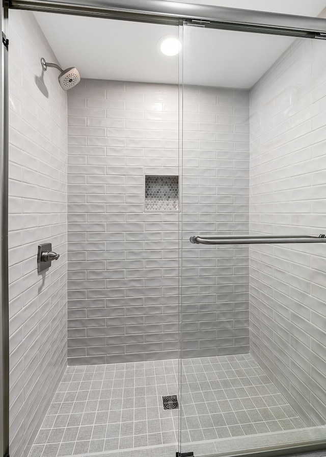 bathroom with an enclosed shower