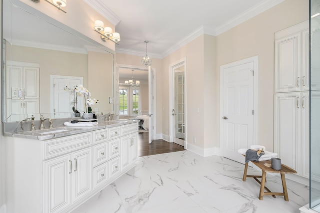 bathroom with vanity and crown molding