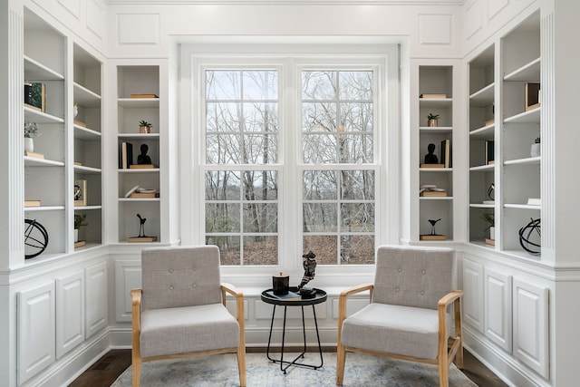 living area with dark wood-type flooring