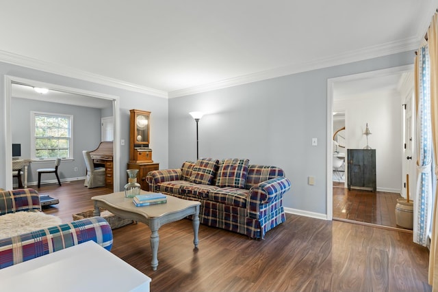 living room featuring dark hardwood / wood-style floors and ornamental molding