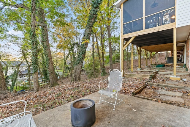 view of patio / terrace with a sunroom