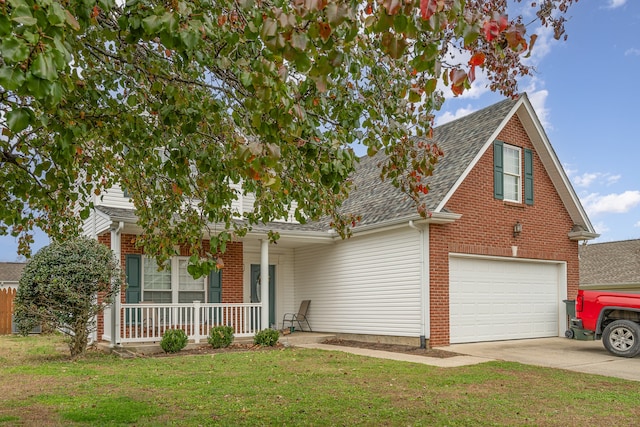 view of front of property with a front lawn, a porch, and a garage