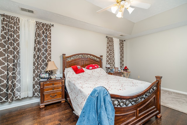 bedroom featuring ceiling fan and dark hardwood / wood-style floors