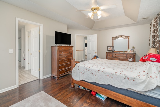 bedroom with ceiling fan and dark wood-type flooring