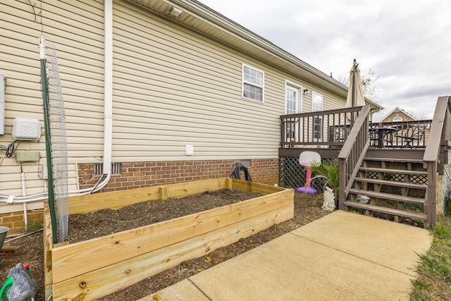 view of patio featuring a wooden deck