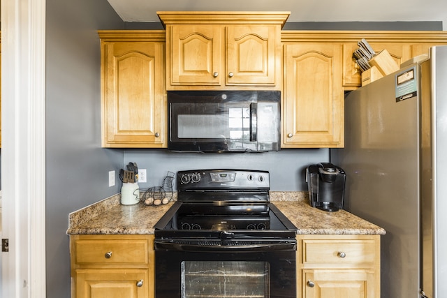 kitchen featuring light stone countertops, light brown cabinets, and black appliances