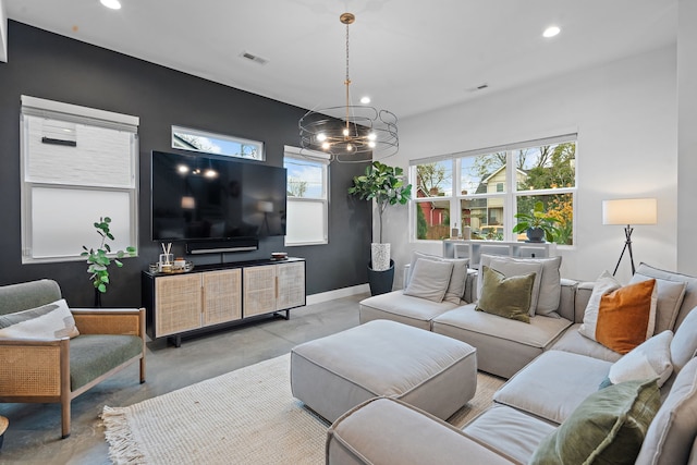 living room with an inviting chandelier