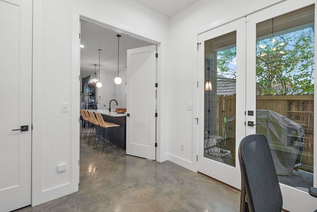 office space with concrete flooring