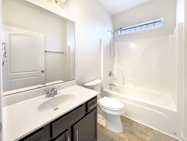 full bathroom featuring toilet, vanity, and bathing tub / shower combination